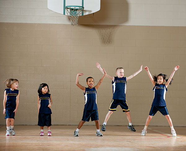 Kids doing jumping jacks