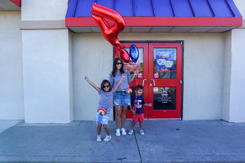 Family outside of Chuck E. Cheese
