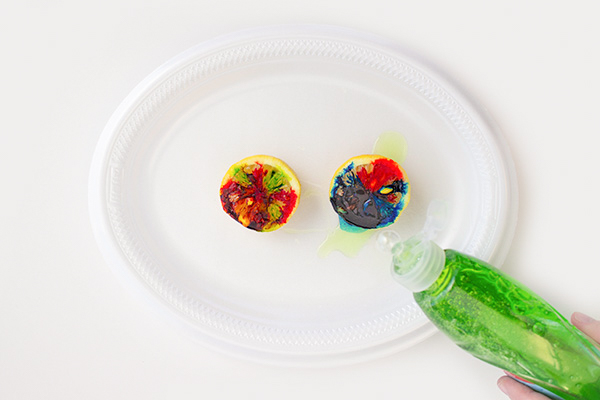 dishwashing liquid on food coloring on lemon