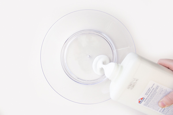 Add 8 oz of Elmer's glue to the container